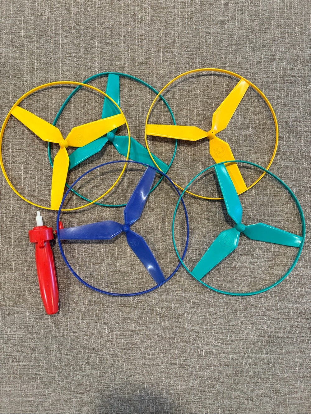 Vintage Give it a Whirl Hand-Launcher Propeller Set — Yellow, Teal, Blue, Red